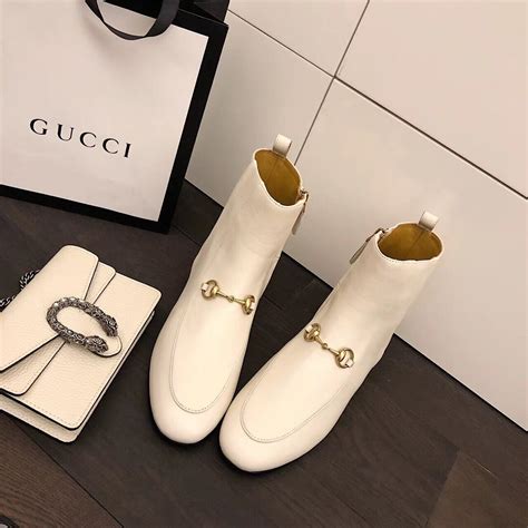 gucci quilted leather ankle boot with belt|gucci jordaan leather ankle boots.